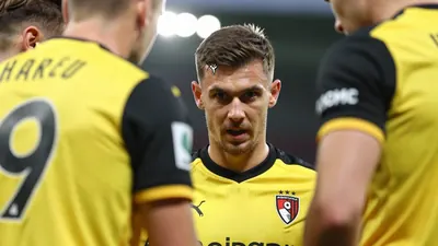 Bournemouth's pre-season friendly against Mainz 05 ended in a 2-1 defeat, with Willi's late strike securing the win for...