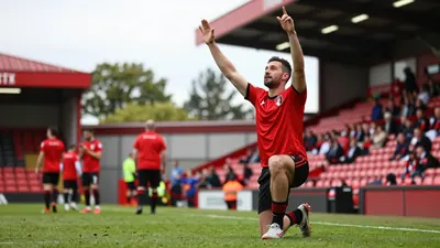 Prime Minister Andy Burnham has called the 1985 law banning alcohol in sight of the pitch outdated, suggesting a trial...