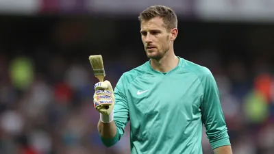 Bournemouth's new third kit launch sparks a unique art show, with ex-keeper David James painting Steve Fletcher's iconic...